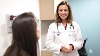 Silvana Ribaudo, MD, meets with a patient